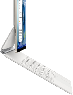 iPad Air, kolor księżycowej poświaty, połączony z klawiaturą Magic Keyboard, kolor biały, bok obudowy